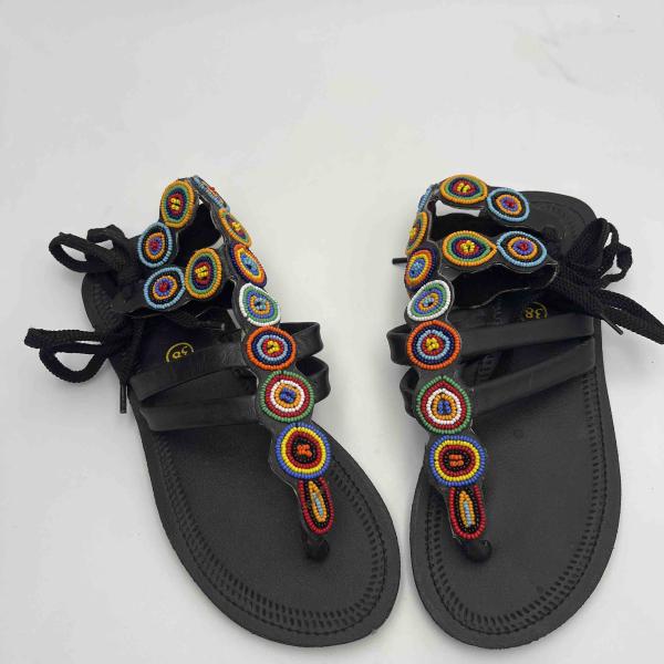 African lays up sandals