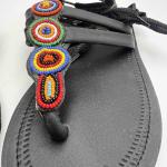 African lays up sandals
