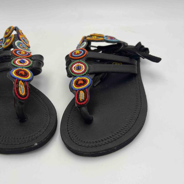 African lays up sandals